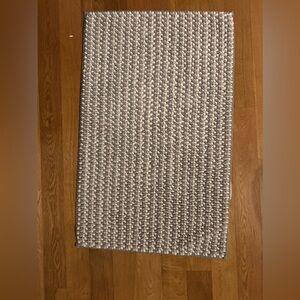 Gray and White Textured Rug or bath mat
